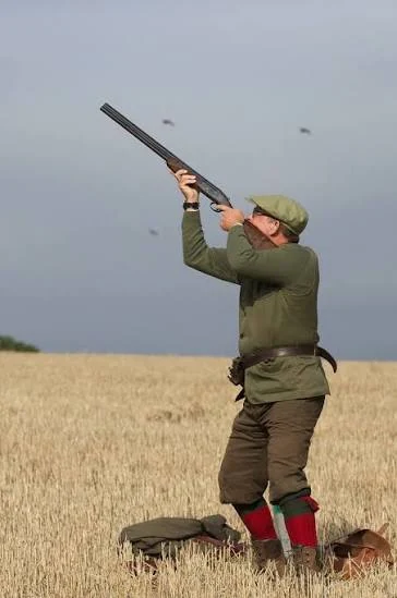 Person shooting outdoors